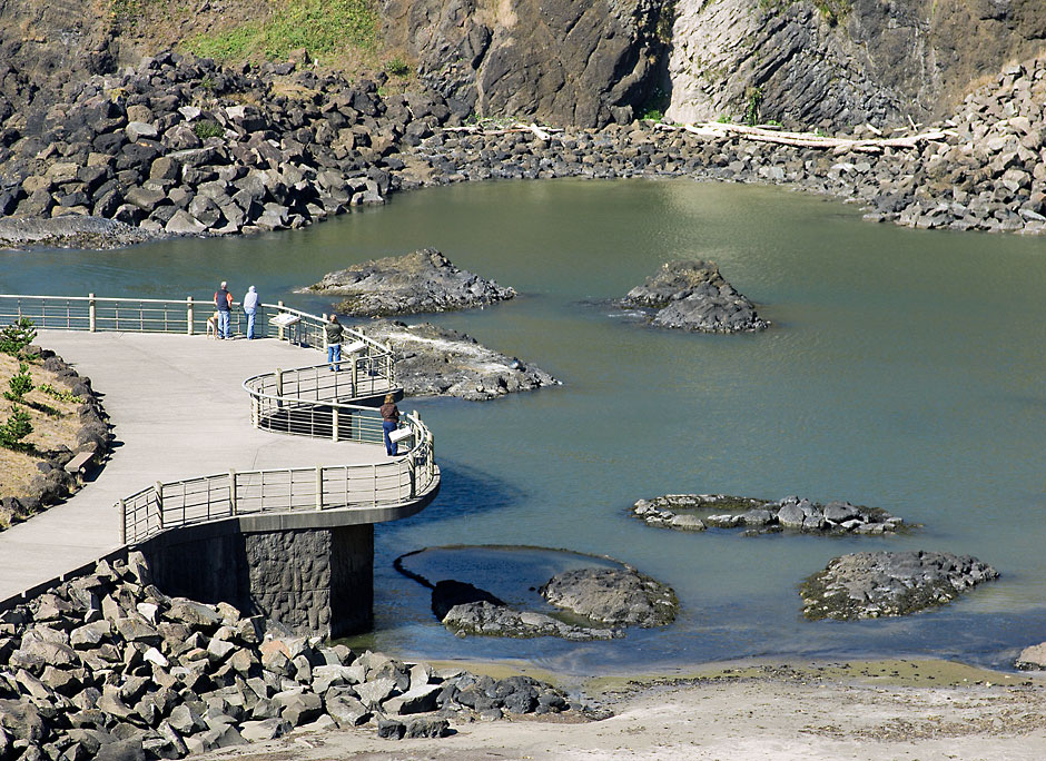 People gaze at the Tide Pools of Yaquina Head Outstanding Natural Area