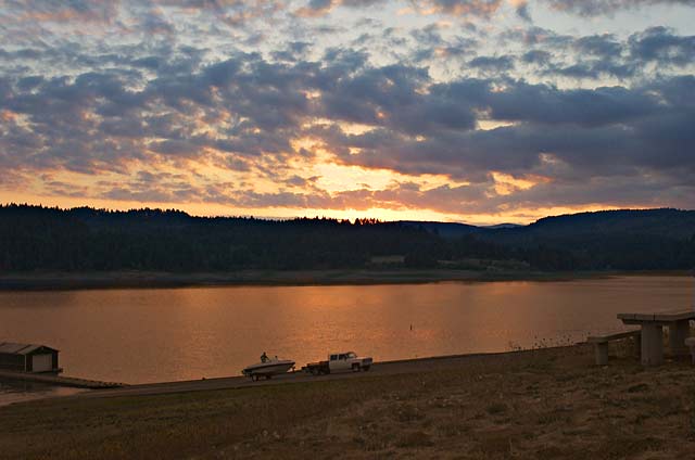 Pickup Tows boat off of Colorful Hagg Lake just before sunset; great clouds picture sold as framed art or canvas