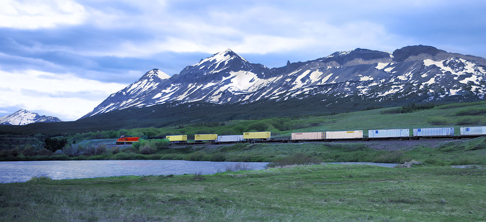 Buy this Montana Trains are VERY important.  Train beneath the Rockies photograph