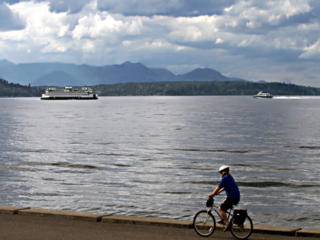 Scenic Washington, Puget Sound, Biker and Boats from Alki Avenue West Seattle
