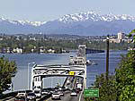 Evergreen Floating Bridge crosses Lake Washington; Olympic Mts